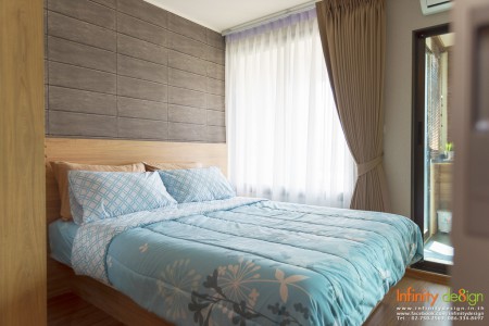 ห้องนอนที่มีการตกแต่งด้วยผ้าม่านจีบโทนสีน้ำตาล @ U Delight Residence Riverfront พระราม 3