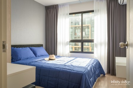 ห้องนอนตกแต่งด้วยผ้าม่าน สีเทา @ iCondo Green Space สุขุมวิท 77