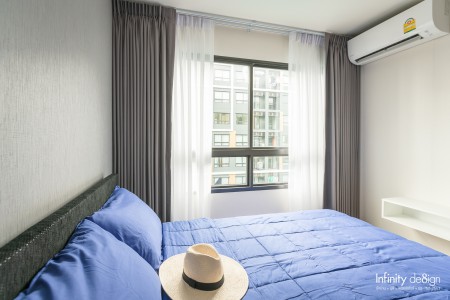 ห้องนอนตกแต่งด้วยผ้าโปร่ง สีขาว @ iCondo Green Space สุขุมวิท 77