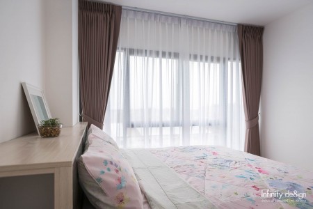 ห้องนอนตกแต่งด้วยผ้าม่านจีบ สีน้ำตาล @ Ploen Ploen รังสิต-เวิร์คพอยท์